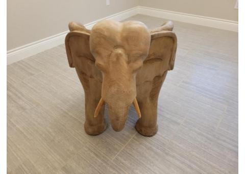 Carved hardwood elephant chair.
